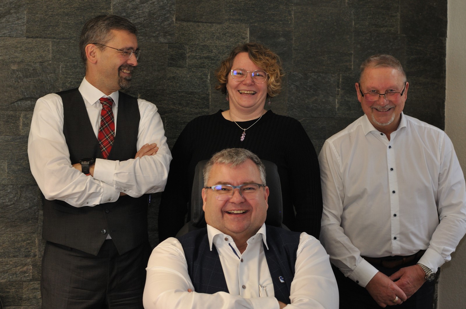 Gruppenfoto der Anwälte mit Sekretärin